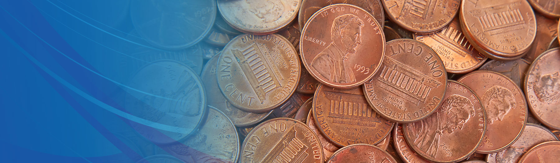 A pile of pennies, showing fronts and backs of the coins.